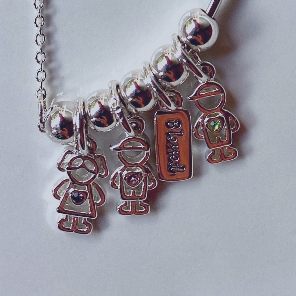 Necklace with 3 Child Pendents